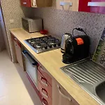 Апартаменты Igi Red Flat With Free Private Parking